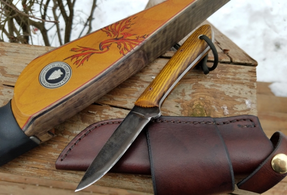My St. Joe River Longbow "Phoenix" and my brand new Lucas Forge Packer knife.